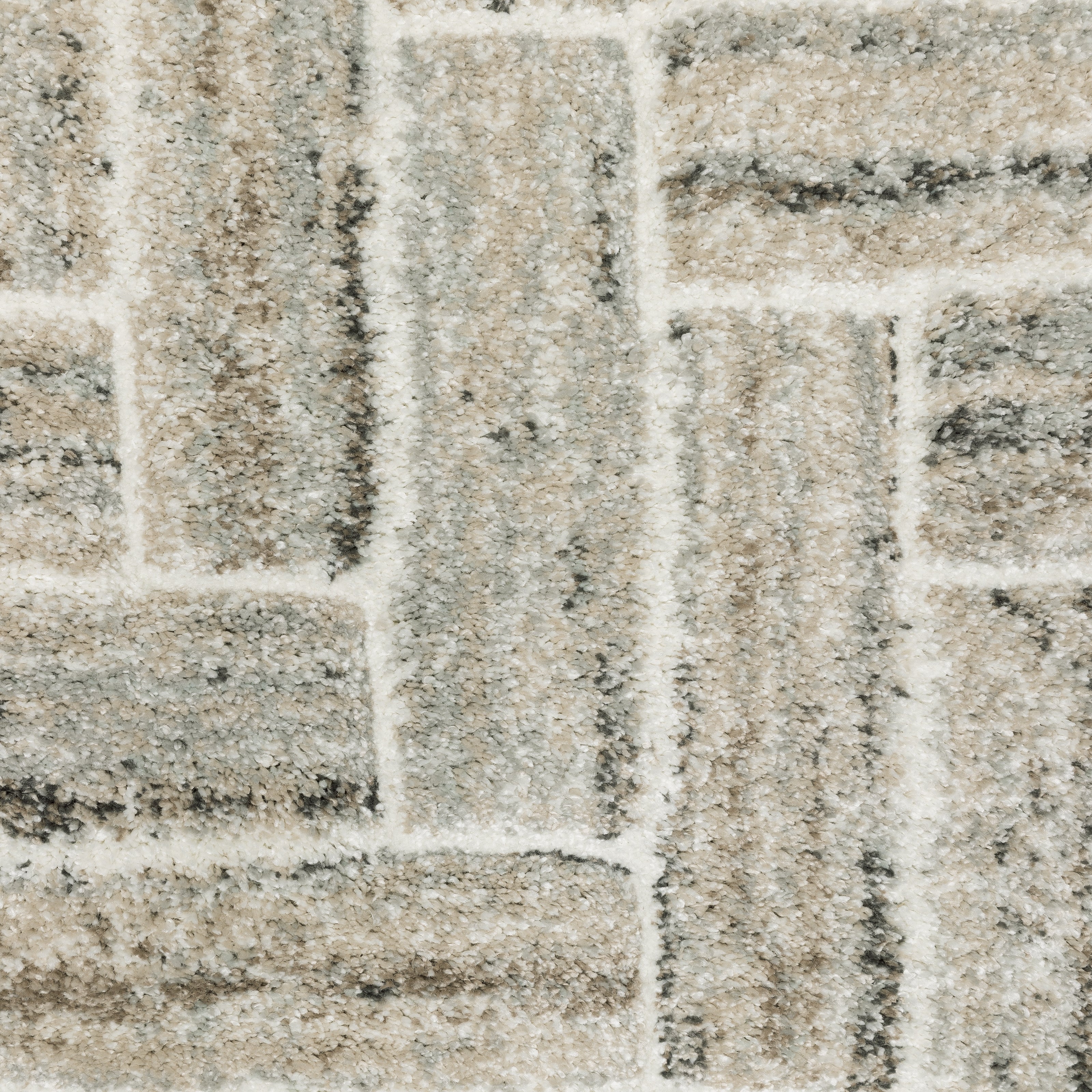 Oriental Weavers Cambria 093L2 plush modern rug featuring abstract pattern in ivory/ beige tones