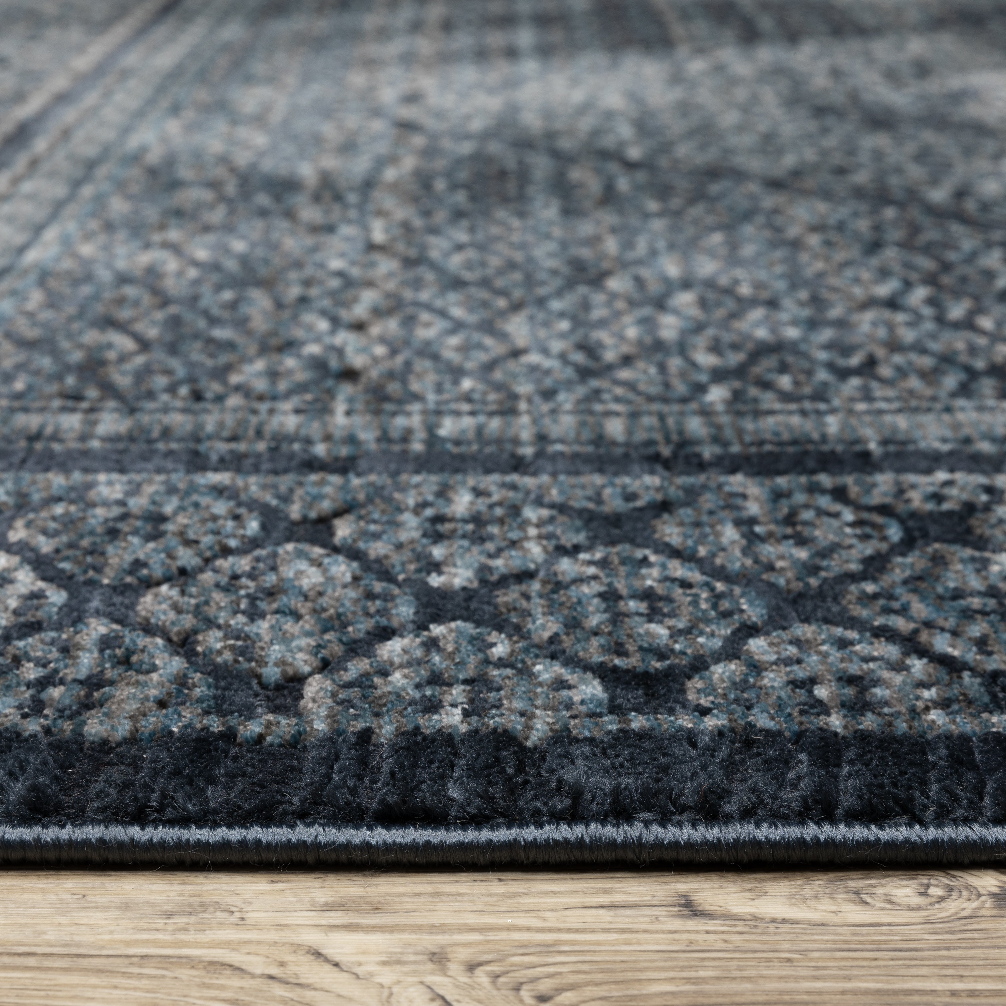 Oriental Weavers Capella CAP01 soft transitional rug featuring textured design in blue/ teal tones