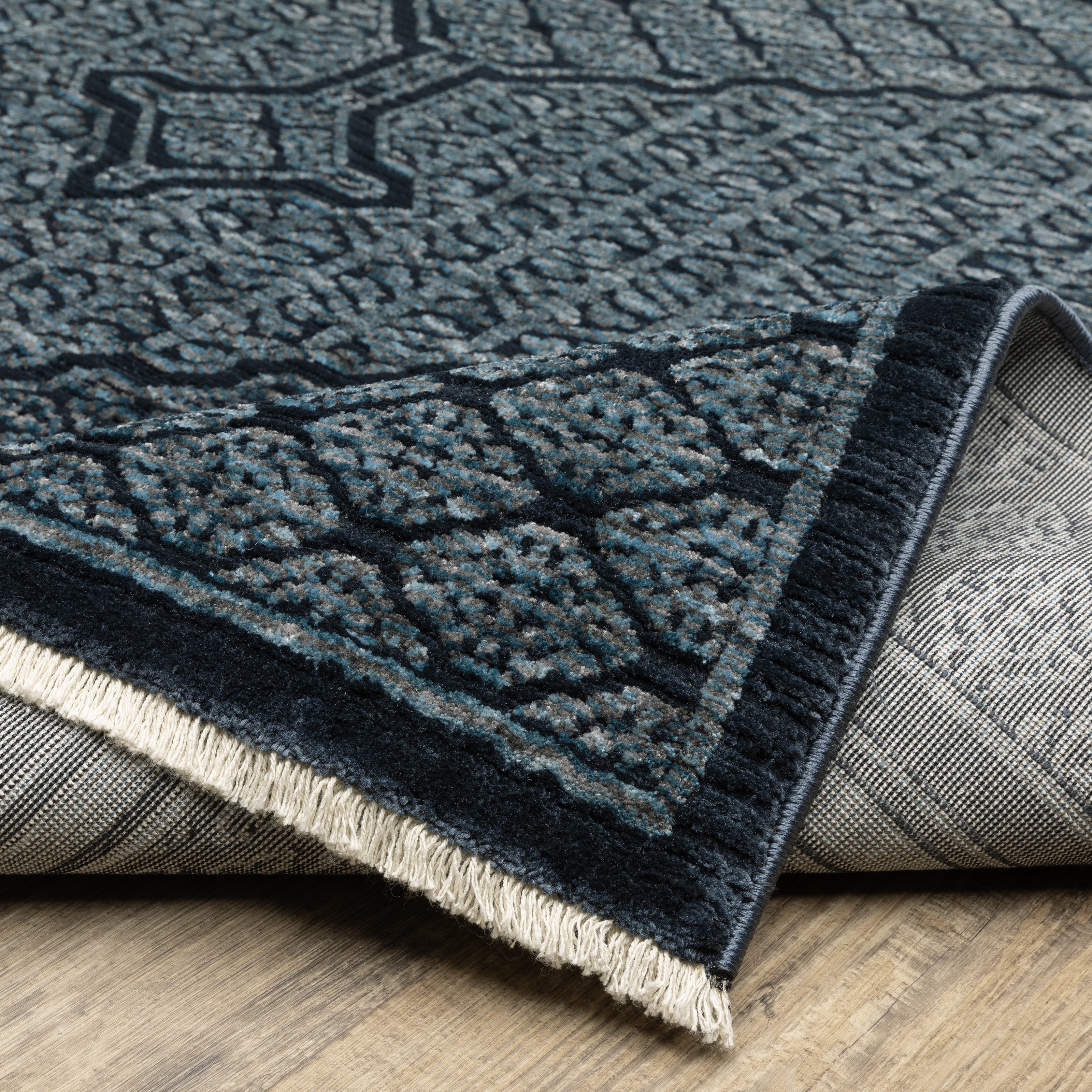 Oriental Weavers Capella CAP01 soft transitional rug featuring textured design in blue/ teal tones
