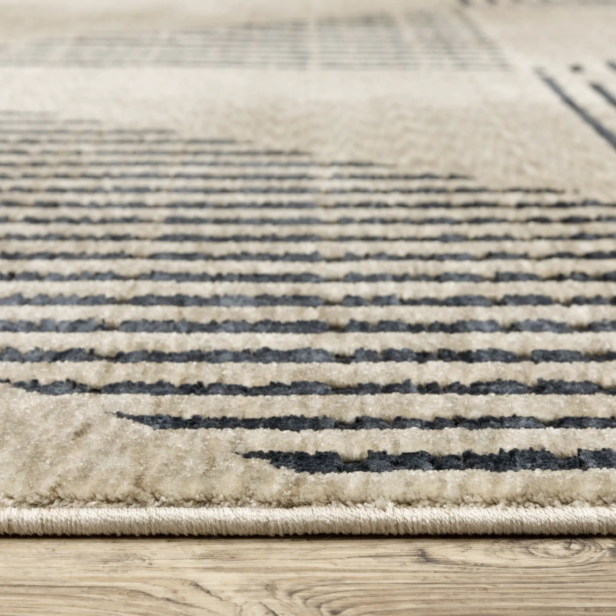 Capella CAP04 Beige/ Deep Navy Area Rug by Oriental Weavers
