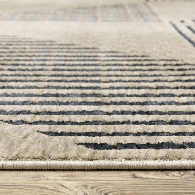 Oriental Weavers Capella CAP04 soft transitional rug featuring textured design in beige/ deep navy tones