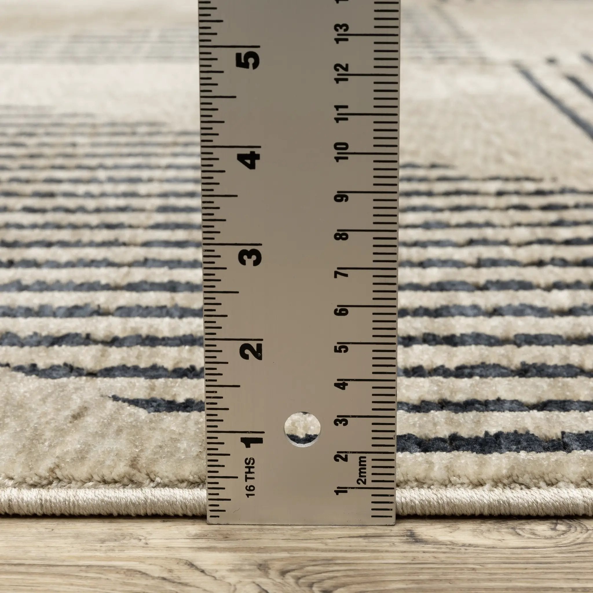 Capella CAP04 Beige/ Deep Navy Area Rug by Oriental Weavers