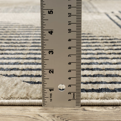 Oriental Weavers Capella CAP04 soft transitional rug featuring textured design in beige/ deep navy tones