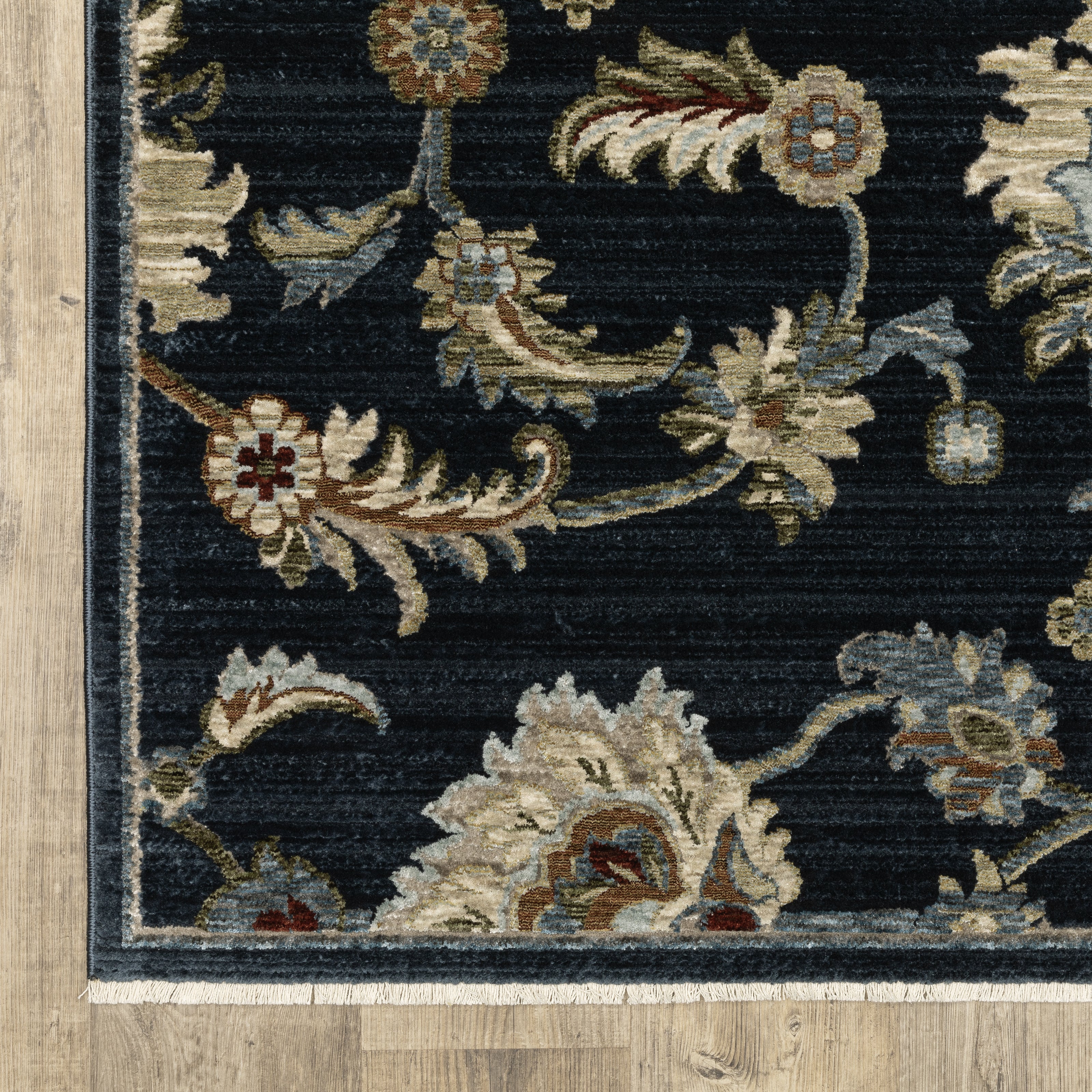 Oriental Weavers Capella CAP05 soft transitional rug featuring textured design in navy blue/ multi tones