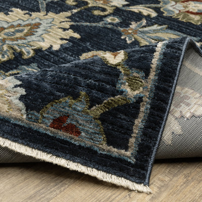 Oriental Weavers Capella CAP05 soft transitional rug featuring textured design in navy blue/ multi tones
