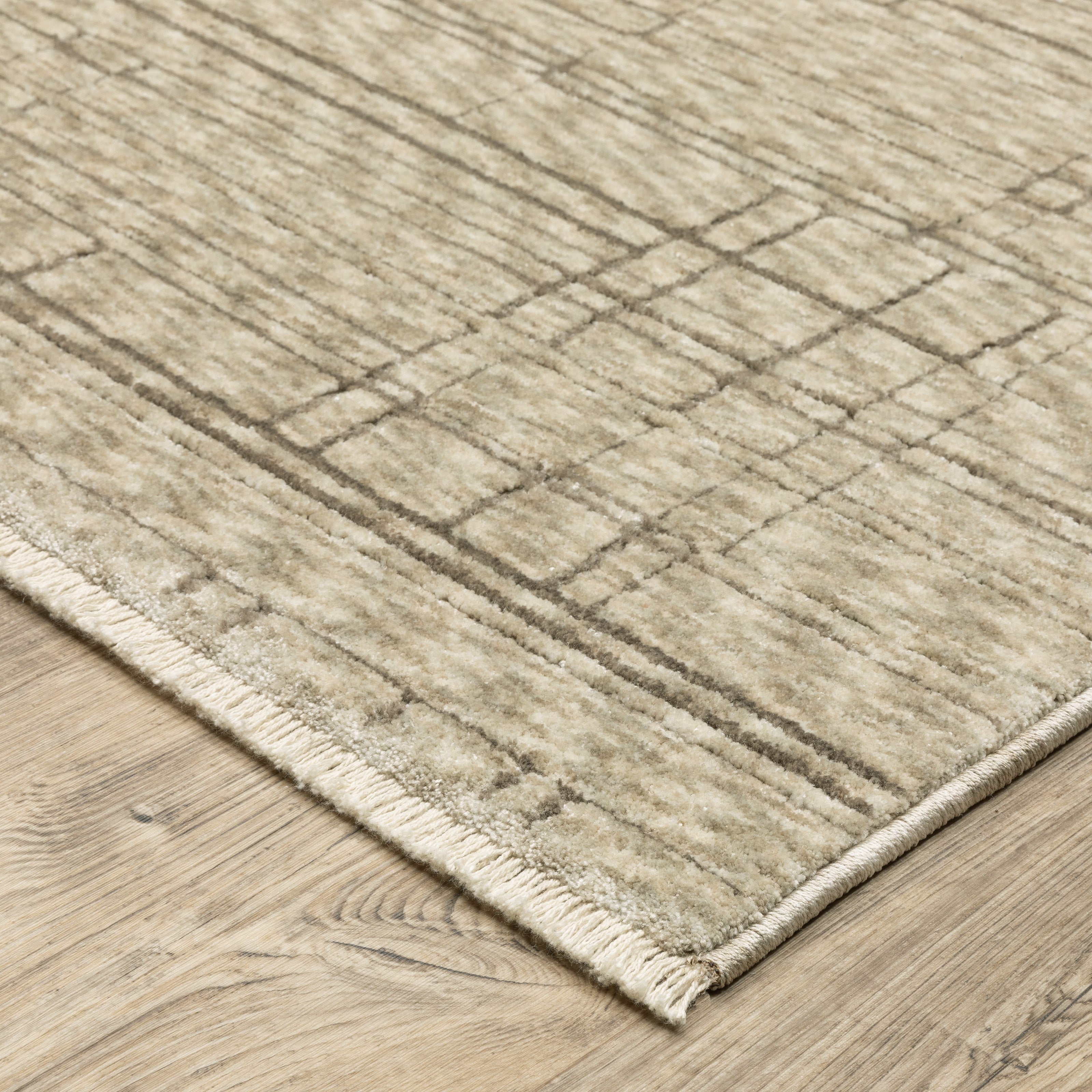 Oriental Weavers Capella CAP07 soft transitional rug featuring textured design in beige/ brown tones
