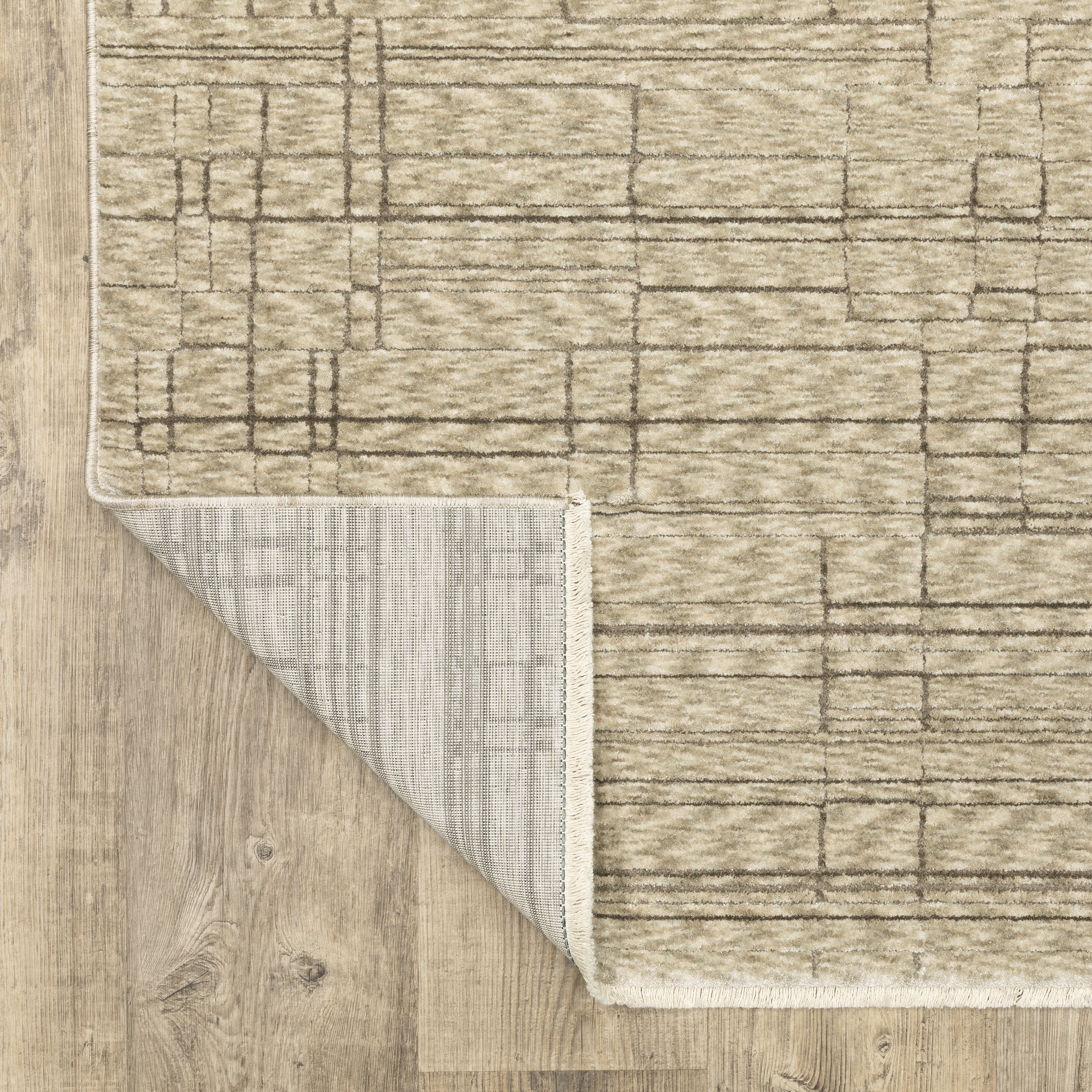 Oriental Weavers Capella CAP07 soft transitional rug featuring textured design in beige/ brown tones