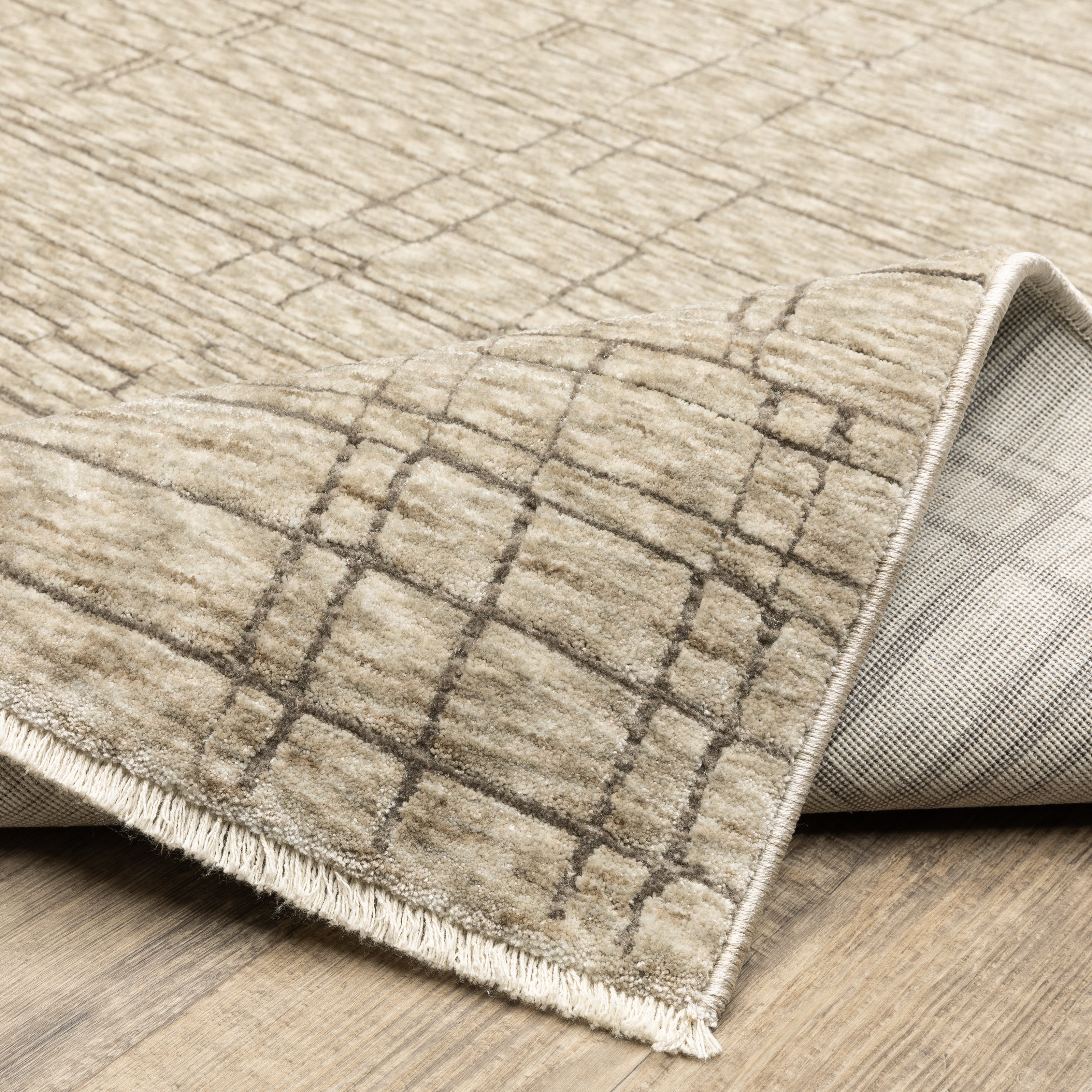 Oriental Weavers Capella CAP07 soft transitional rug featuring textured design in beige/ brown tones