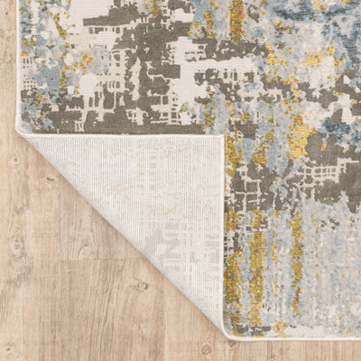 Oriental Weavers Caravan 1340W soft area rug featuring textured design in grey/ blue tones