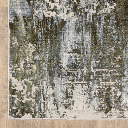 Oriental Weavers Caravan 2060F soft area rug featuring textured design in green/ blue tones