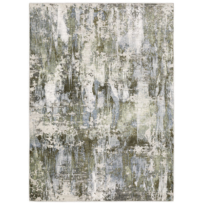 Oriental Weavers Caravan 2060F soft area rug featuring textured design in green/ blue tones