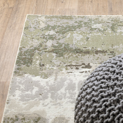 Oriental Weavers Caravan 2061W soft area rug featuring textured design in beige/ green tones