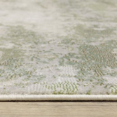 Oriental Weavers Caravan 2061W soft area rug featuring textured design in beige/ green tones