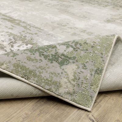 Oriental Weavers Caravan 2061W soft area rug featuring textured design in beige/ green tones