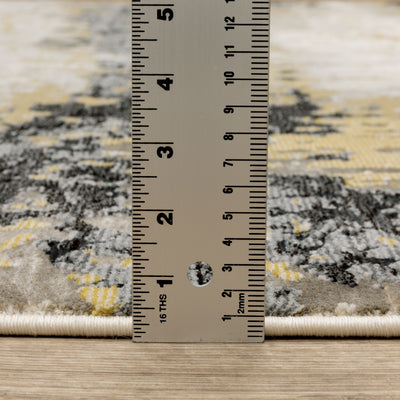 Oriental Weavers Caravan 2061X soft area rug featuring textured design in grey/ gold tones