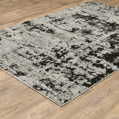 Oriental Weavers Caravan 4153Q soft area rug featuring textured design in grey/ black tones