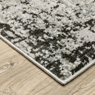 Oriental Weavers Caravan 4153Q soft area rug featuring textured design in grey/ black tones