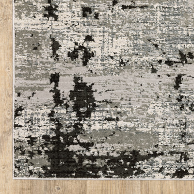 Oriental Weavers Caravan 4153Q soft area rug featuring textured design in grey/ black tones