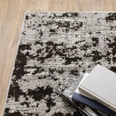 Oriental Weavers Caravan 4153Q soft area rug featuring textured design in grey/ black tones