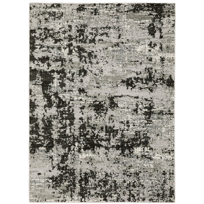 Oriental Weavers Caravan 4153Q soft area rug featuring textured design in grey/ black tones