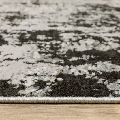 Oriental Weavers Caravan 4153Q soft area rug featuring textured design in grey/ black tones