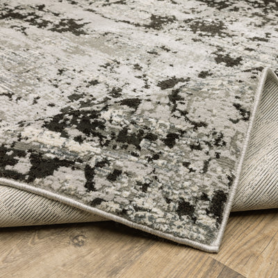 Oriental Weavers Caravan 4153Q soft area rug featuring textured design in grey/ black tones