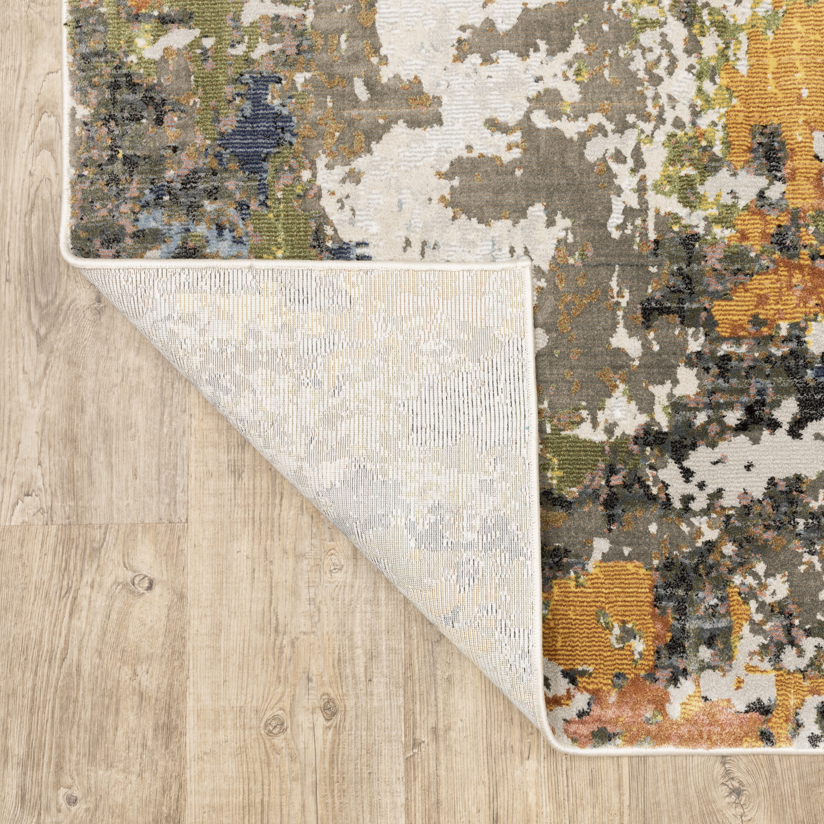 Oriental Weavers Caravan 502X8 soft area rug featuring textured design in grey/ multi tones