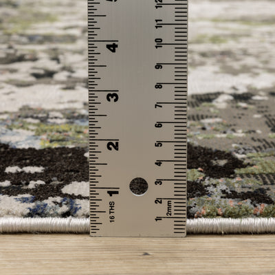Oriental Weavers Caravan 502Z8 soft area rug featuring textured design in grey/ green tones