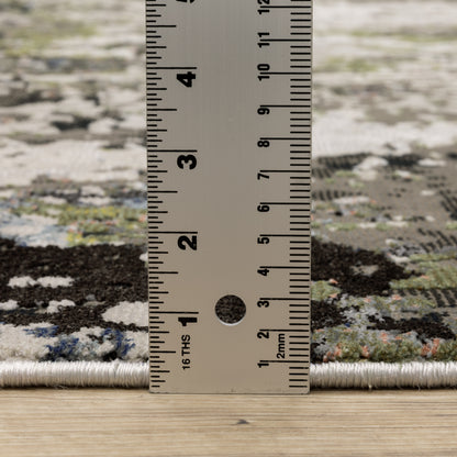 Oriental Weavers Caravan 502Z8 soft area rug featuring textured design in grey/ green tones
