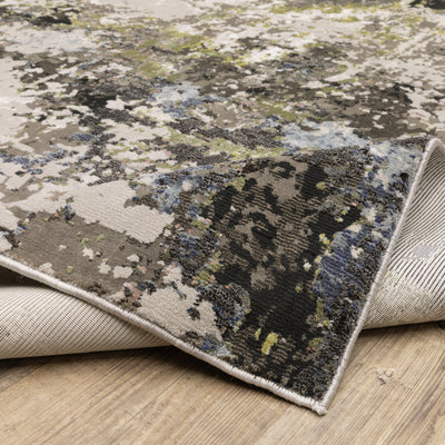 Oriental Weavers Caravan 502Z8 soft area rug featuring textured design in grey/ green tones