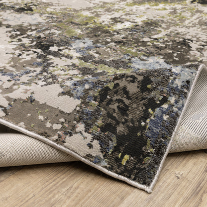 Oriental Weavers Caravan 502Z8 soft area rug featuring textured design in grey/ green tones