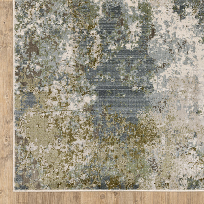 Oriental Weavers Caravan 5090E soft area rug featuring textured design in blue/ green tones