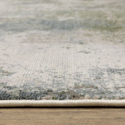Oriental Weavers Caravan 5090E soft area rug featuring textured design in blue/ green tones