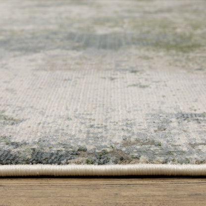 Oriental Weavers Caravan 5090E soft area rug featuring textured design in blue/ green tones