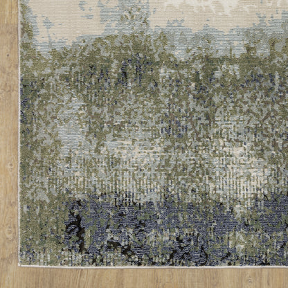 Oriental Weavers Caravan 5571H soft area rug featuring textured design in blue/ green tones