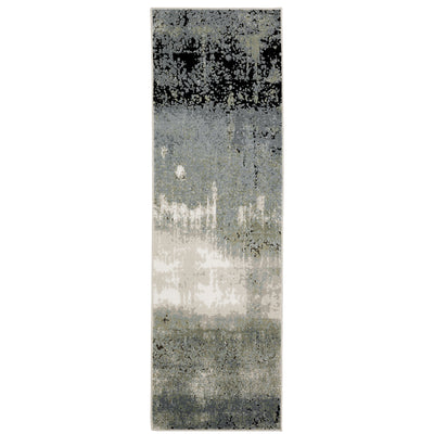 Oriental Weavers Caravan 5571H soft area rug featuring textured design in blue/ green tones
