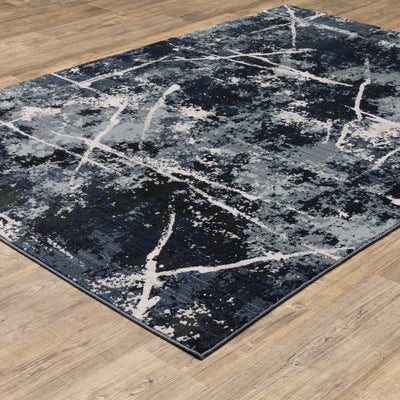 Oriental Weavers Caravan 7150B soft area rug featuring textured design in blue/ grey tones