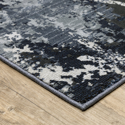 Oriental Weavers Caravan 7150B soft area rug featuring textured design in blue/ grey tones