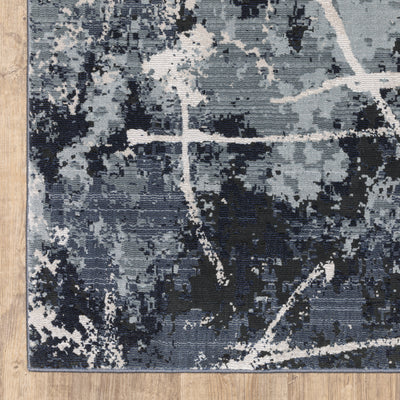 Oriental Weavers Caravan 7150B soft area rug featuring textured design in blue/ grey tones