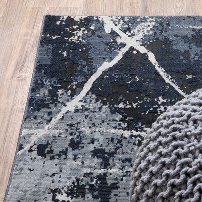 Oriental Weavers Caravan 7150B soft area rug featuring textured design in blue/ grey tones