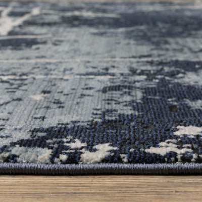 Oriental Weavers Caravan 7150B soft area rug featuring textured design in blue/ grey tones