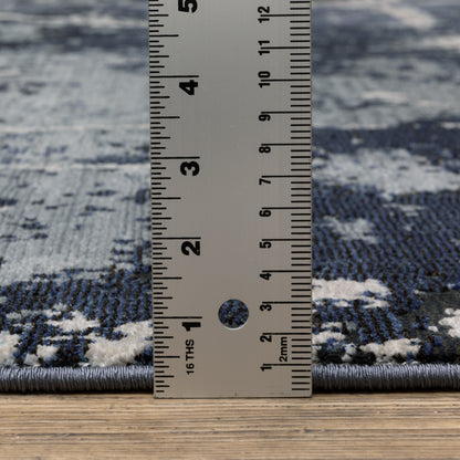 Oriental Weavers Caravan 7150B soft area rug featuring textured design in blue/ grey tones