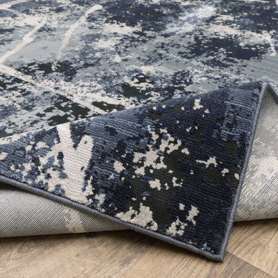 Oriental Weavers Caravan 7150B soft area rug featuring textured design in blue/ grey tones