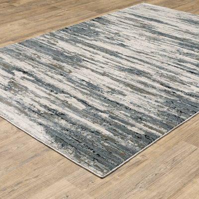 Oriental Weavers Caravan 750W8 soft area rug featuring textured design in blue/ grey tones