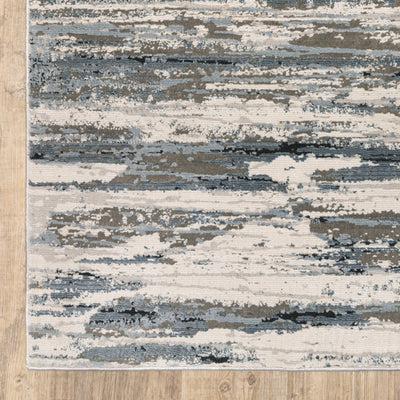 Oriental Weavers Caravan 750W8 soft area rug featuring textured design in blue/ grey tones