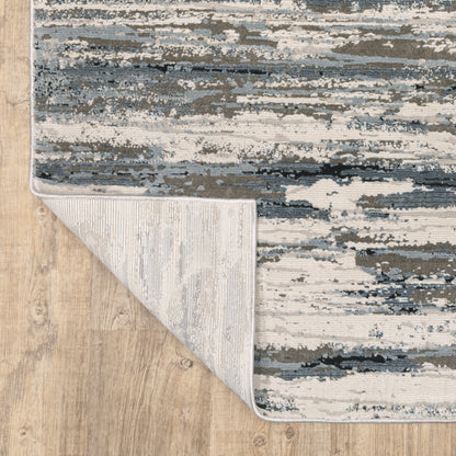 Oriental Weavers Caravan 750W8 soft area rug featuring textured design in blue/ grey tones