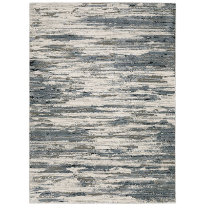 Oriental Weavers Caravan 750W8 soft area rug featuring textured design in blue/ grey tones