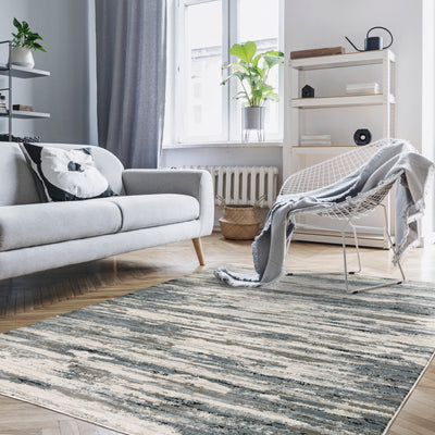 Oriental Weavers Caravan 750W8 soft area rug featuring textured design in blue/ grey tones