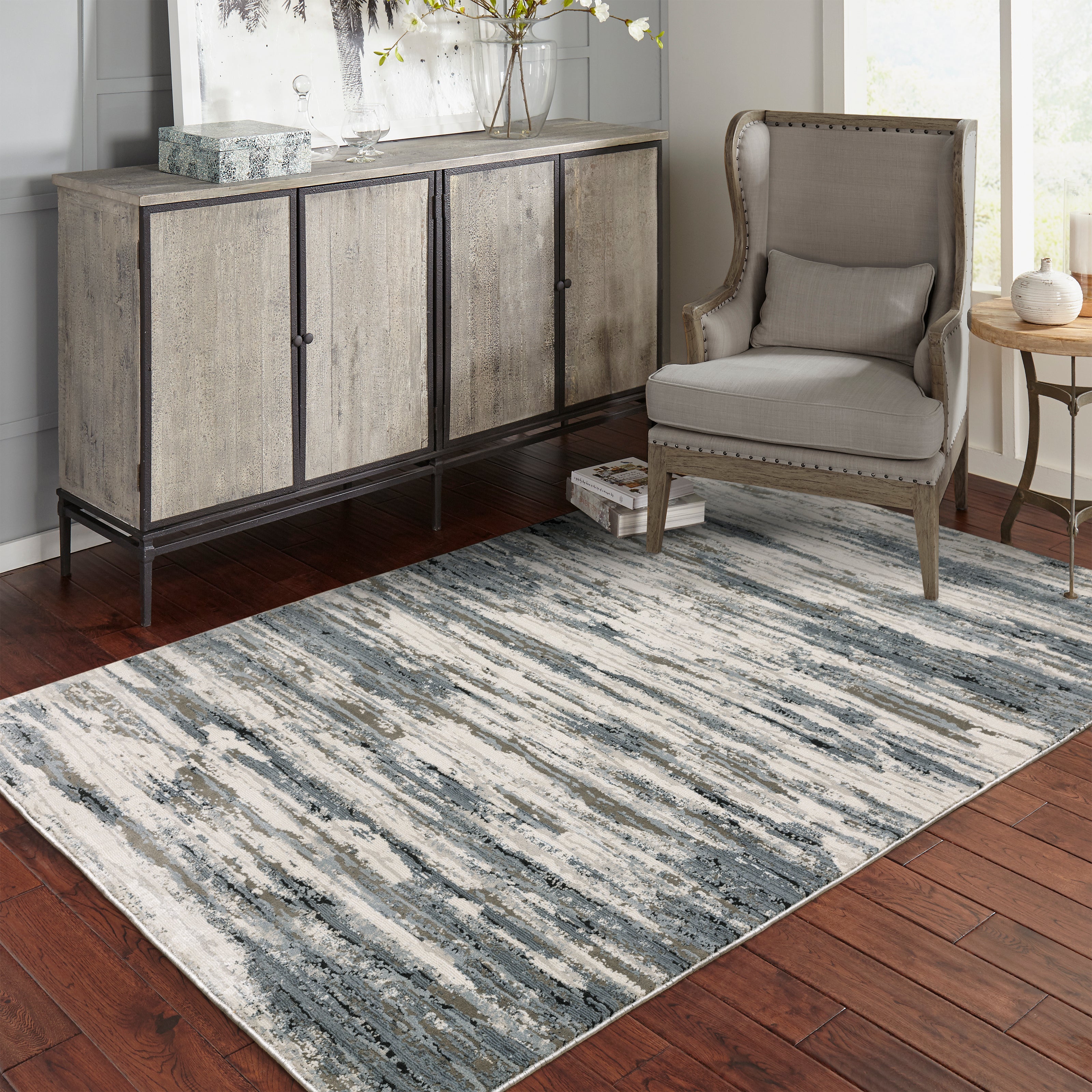 Oriental Weavers Caravan 750W8 soft area rug featuring textured design in blue/ grey tones