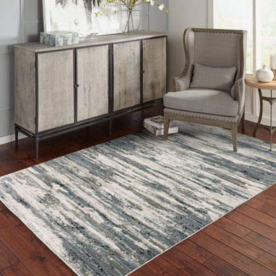 Oriental Weavers Caravan 750W8 soft area rug featuring textured design in blue/ grey tones